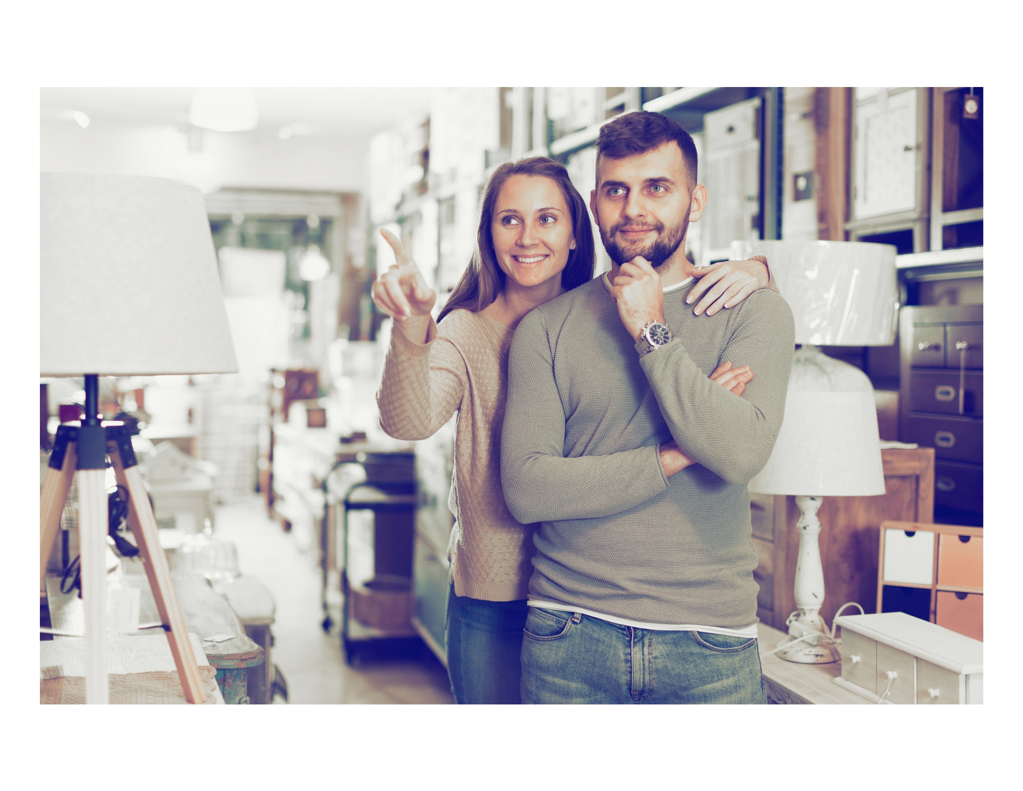 Shoppers browsing lamps and home goods in the store